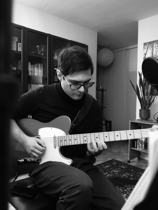 Matt Fudemoto playing guitar